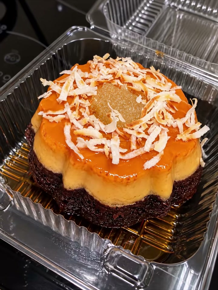 Caramel-glazed mini chocoflan sprinkled with shredded coconut